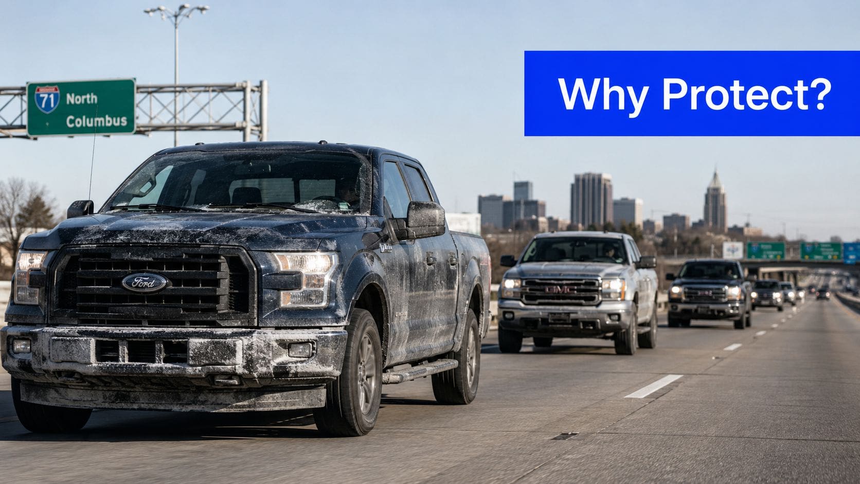 A line of pickup trucks driving on a highway toward Columbus, Ohio, with a blue protection overlay.